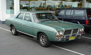 Illustration for article titled Completely random... Aussie Chryslers with Oldsmobile wheels?